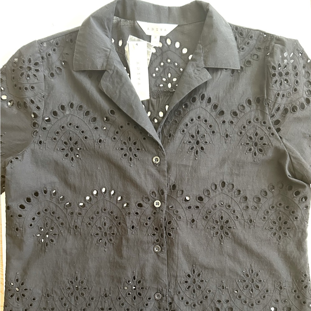 Beautiful eyelet blouse.